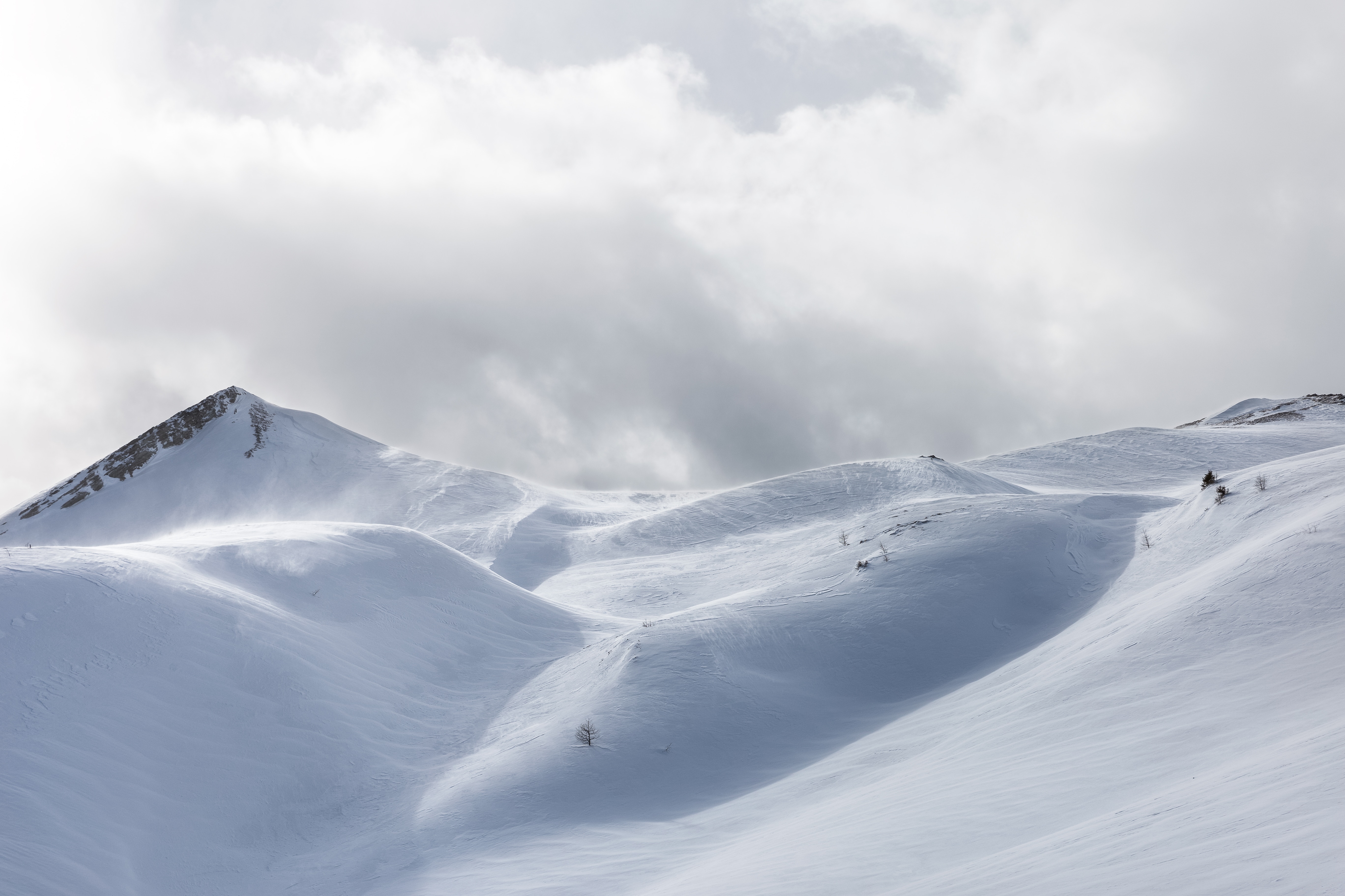 Snow Covered Mountains in Rolle Pass Italy